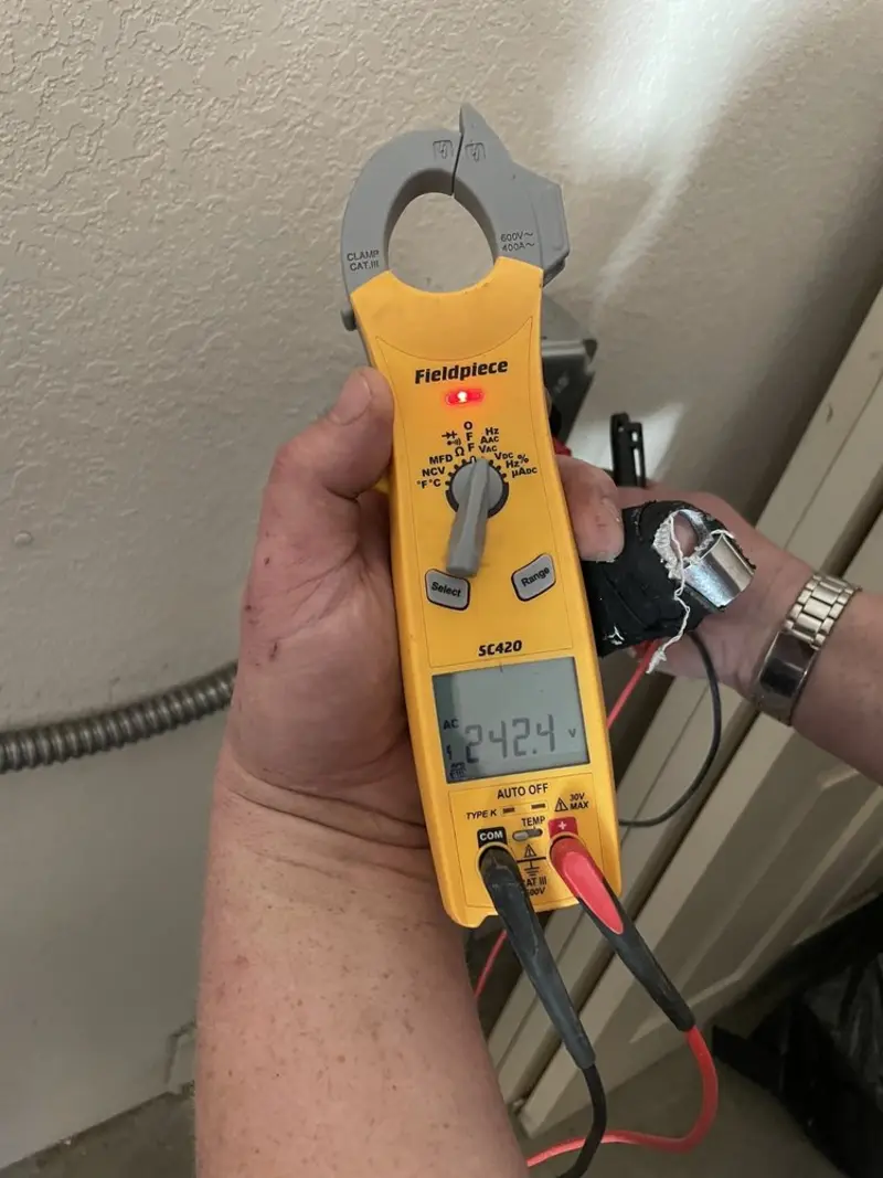 Voltage testing with clamp meter during Circuit Breaker Repair in Williston Park